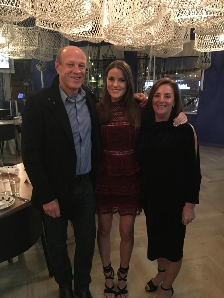 Sarah with her parents