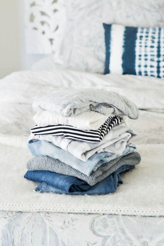 clothing piles - cleaning out your closet