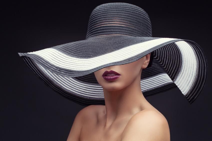 Woman in big summer hat