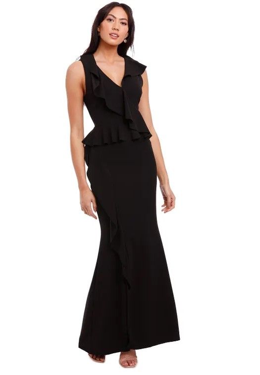 Woman wearing a black thick crepe gown by PASDUCHAS