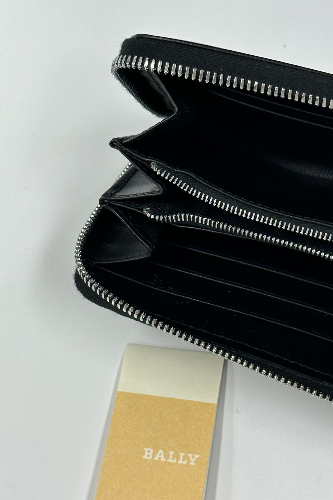 Buy Black Grained Leather Zip Up Wallet | Bally | GlamCorner Buy Black Grained Leather Zip Up Wallet | Bally | GlamCorner
