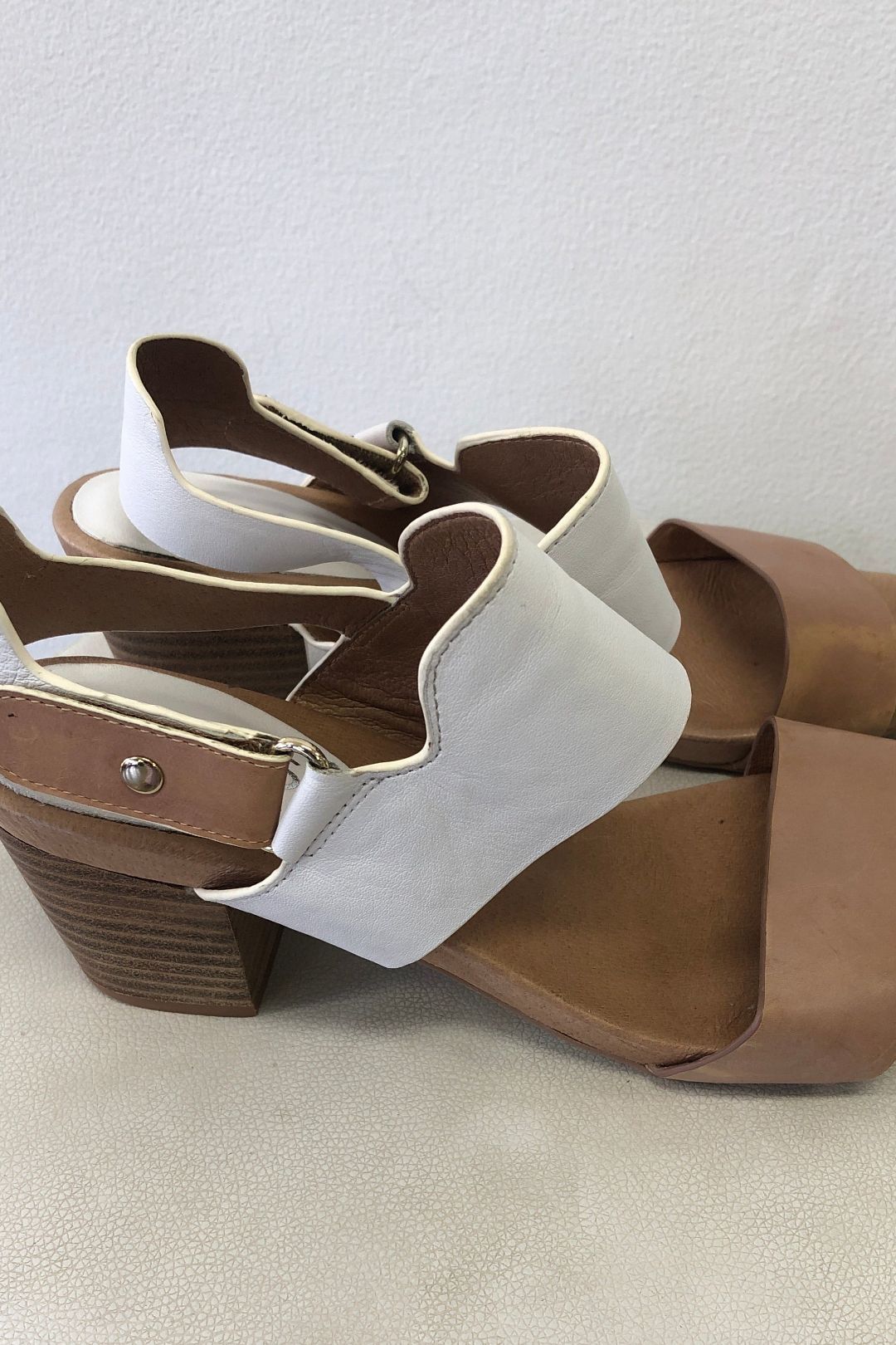 white and tan sandals