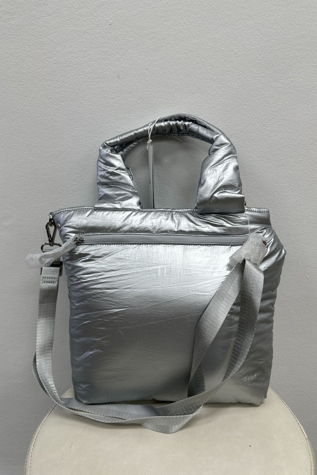 Buy Puffy Alto Bag in Metallic Silver Caraa GlamCorner