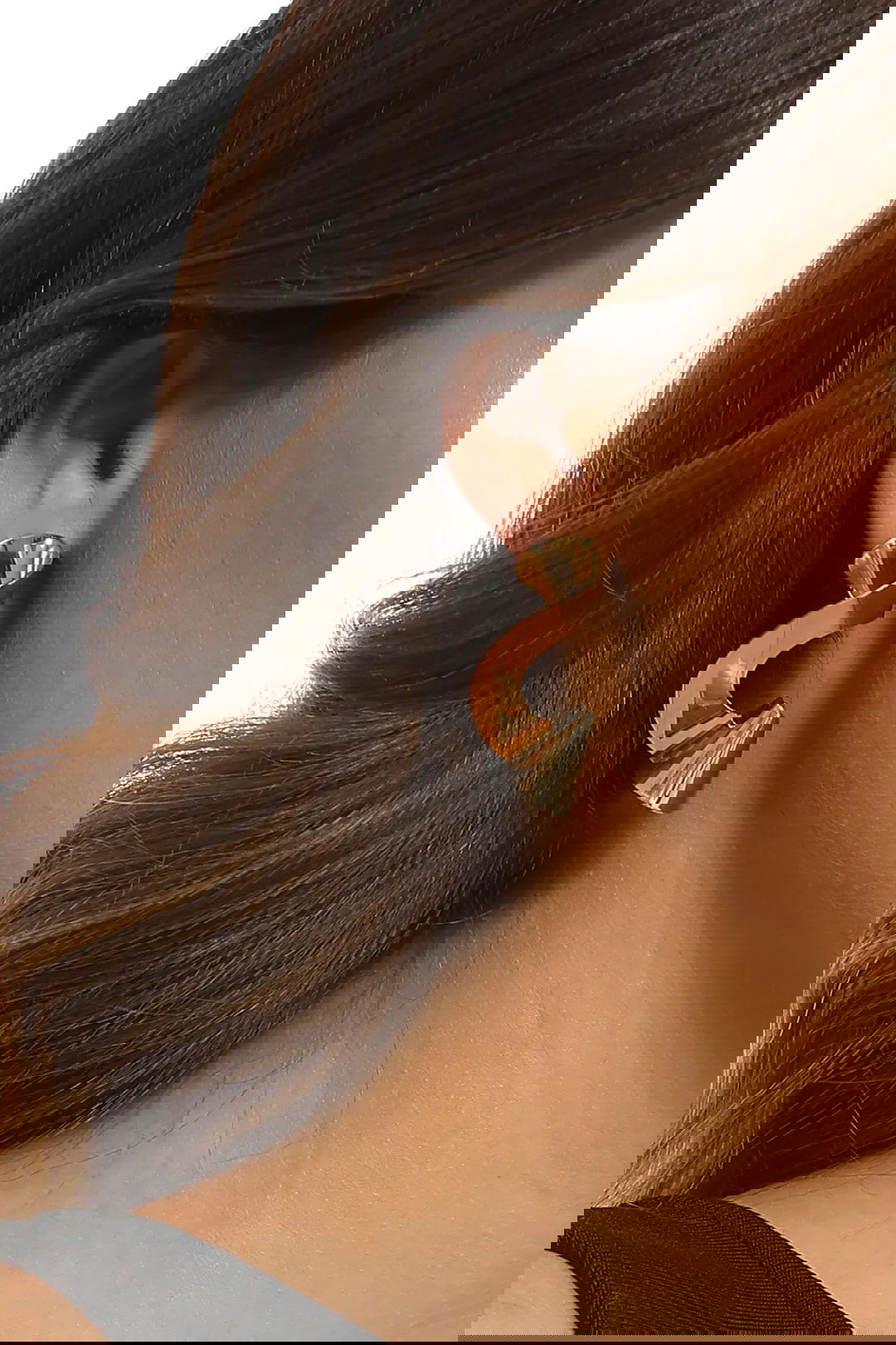 Buy the Abstract Coiled Metal Statement Stud Earring by Adorne