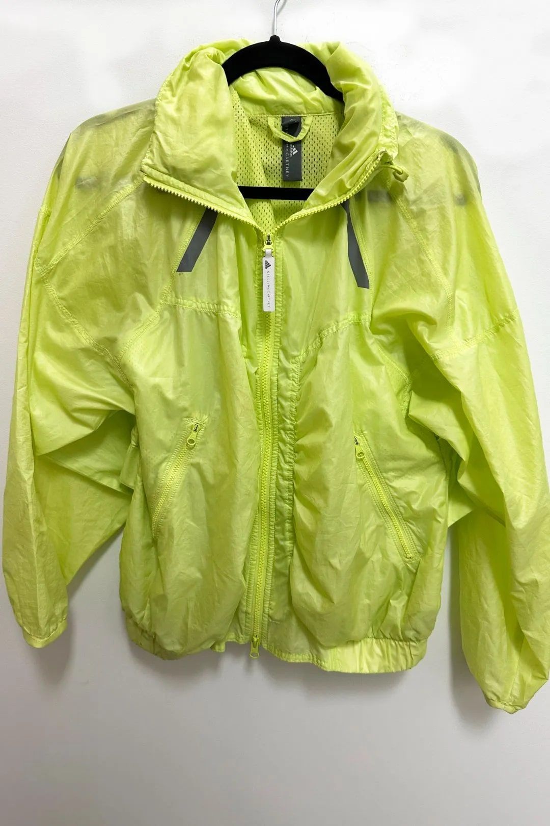 Buy the Neon Green Running Sports Jacket by Adidas by Stella McCartney for workouts